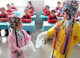 把熱度變?yōu)闊釔?做好中小學(xué)戲劇教育